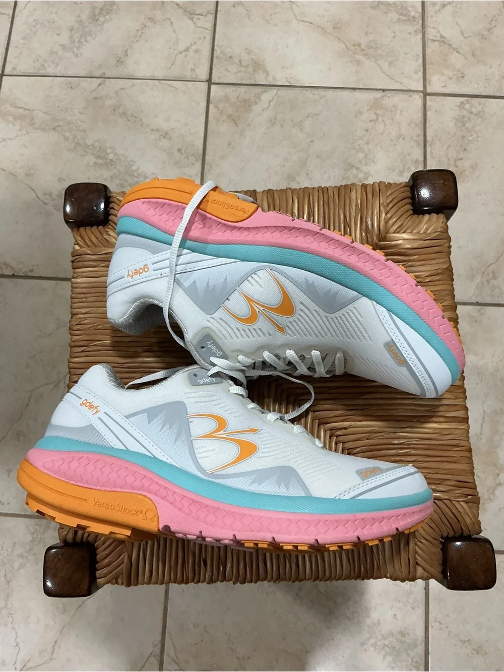 Women’s White Athletic Running Shoe with Pastel Pink, Aqua, and Orange Accents